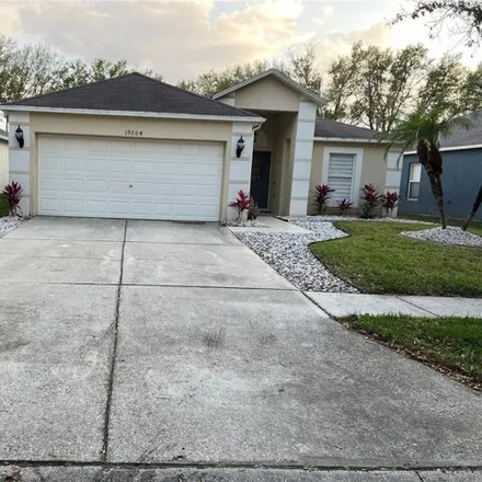 Rent this 3 bed house on 19204 Wood Sage Drive in Tampa, FL 33645