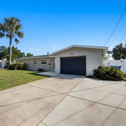 Buy this 3 bed house on 1316 47th Avenue Northeast in Saint Petersburg, FL 33703