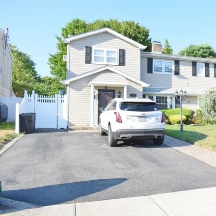 Buy this 5 bed house on 39 Tallow Lane in Levittown, NY 11756