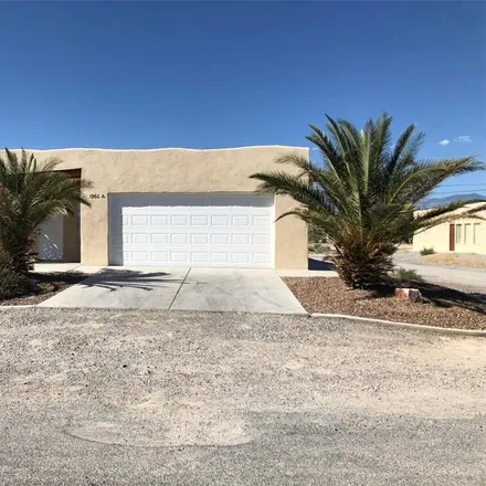 Buy this 8 bed duplex on 1901 Ambush Street in Pahrump, NV 89048