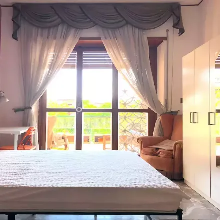 Rent this studio room on Viale Leonardo da Vinci in 00145 Rome RM, Italy