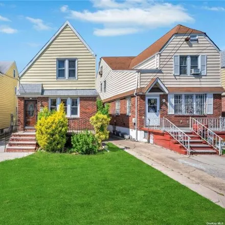 Buy this 4 bed house on 89-50 210th Street in New York, NY 11427