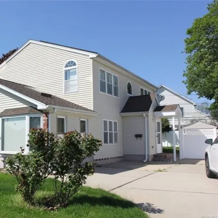 Rent this 4 bed house on 2497 Cypress Avenue in East Meadow, NY 11554