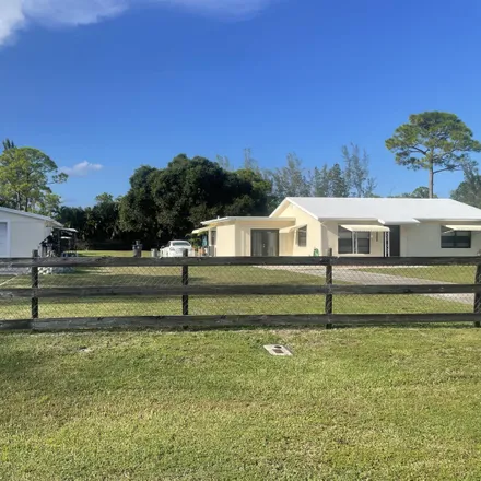 Buy this 3 bed house on 8247 Rodeo Drive in Palm Beach County, FL 33467