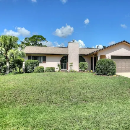 Buy this 3 bed house on 1370 Brandwine Avenue Southeast in Palm Bay, FL 32909