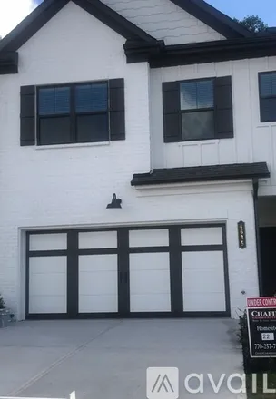 Rent this 3 bed townhouse on 4635 Cypress Park Drive