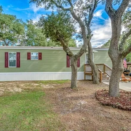 Buy this studio apartment on 161 Carolina Street in Franklin County, FL 32322