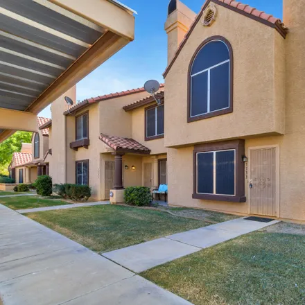 Rent this 2 bed townhouse on 4601 North 102nd Avenue in Phoenix, AZ 85037