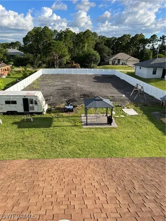 Buy this 3 bed house on 2711 10th Street Southwest in Lehigh Acres, FL 33976