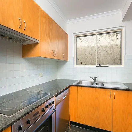 Rent this 2 bed townhouse on 453-465 Bourke Street in Surry Hills NSW 2010, Australia