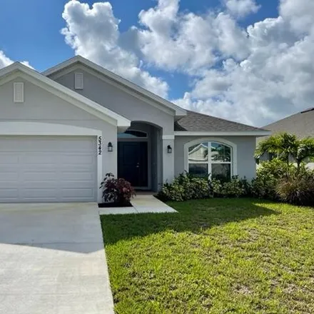 Buy this 4 bed house on 600 Southwest Saragossa Avenue in Port Saint Lucie, FL 34953