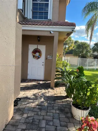 Buy this 2 bed house on 8242 Northwest 191st Lane in Miami-Dade County, FL 33015