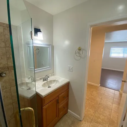 Rent this 3 bed apartment on 5862 Lewis Avenue in Long Beach, CA 90805