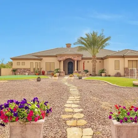 Buy this 5 bed house on 16437 East Queen Creek Road in Gilbert, AZ 85297