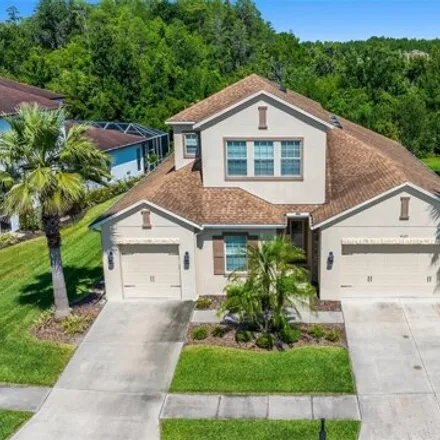 Rent this 5 bed house on 4115 Windcrest Drive in Seven Oaks, Pasco County