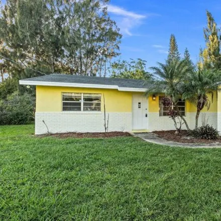 Buy this 3 bed house on 5881 Sunset Boulevard in Indian River Estates, Saint Lucie County