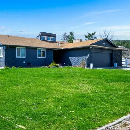 Buy this 4 bed house on 4208 South Sunderland Drive in Spokane Valley, WA 99206