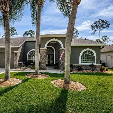 Buy this 4 bed house on 2183 Warwick Drive in East Lake, FL 34677