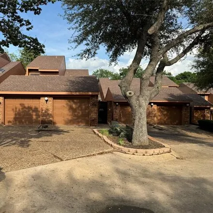 Buy this 2 bed house on Village Green Court in Denison, TX 75020