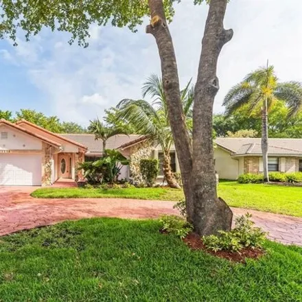 Buy this 4 bed house on 11157 Northwest 7th Street in Coral Springs, FL 33071