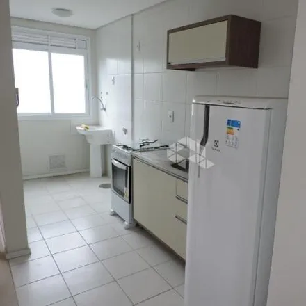 Buy this 2 bed apartment on Casa Mia Pizzaria in Avenida Bento Gonçalves 8819, Lomba do Pinheiro