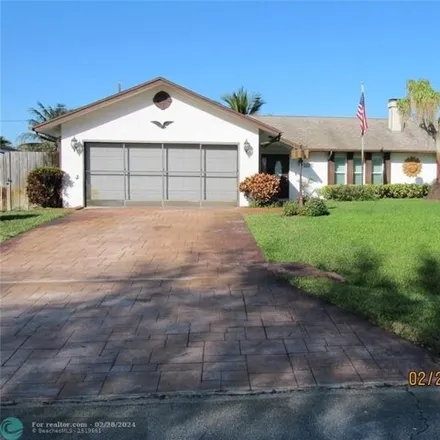 Buy this 3 bed house on 1536 Southeast Croquet Street in Port Saint Lucie, FL 34983