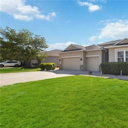 Buy this 4 bed house on 2117 Sunbow Avenue in Apopka, FL 32703