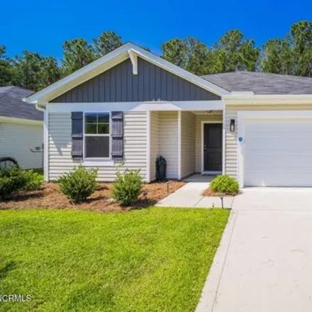 Buy this 3 bed house on Lighthouse Cove Loop in Carolina Shores, Brunswick County