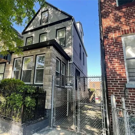 Buy this 6 bed house on 33-37 101st Street in New York, NY 11368