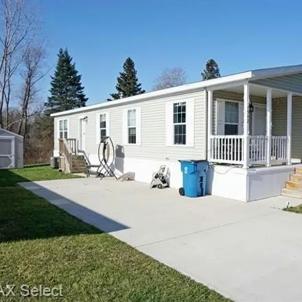 Buy this studio apartment on 15574 Pine Cone Court in Genesee County, MI 48451