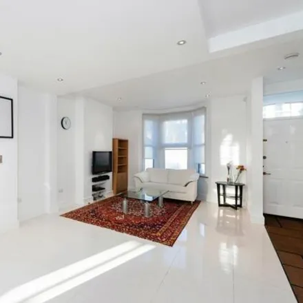 Buy this 4 bed townhouse on 40 Beryl Road in London, W6 8JT