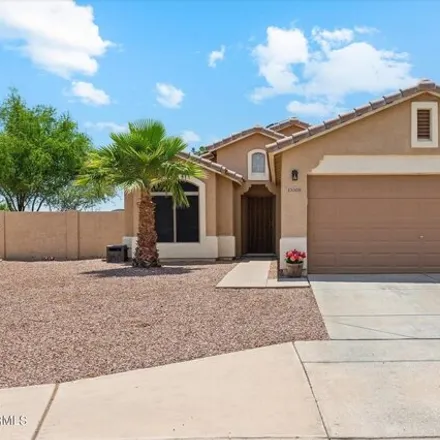 Rent this 3 bed house on 13305 West Port au Prince Lane in Surprise, AZ 85379