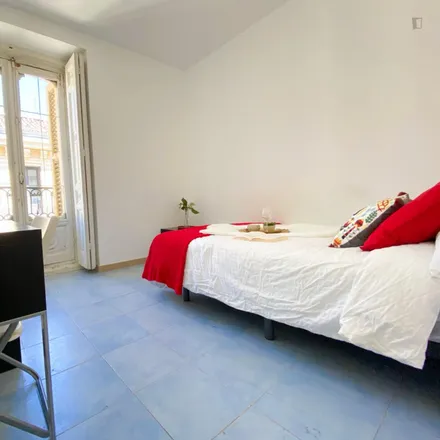 Rent this 7 bed room on Santander Bank in Calle de Galdo, 28013 Madrid