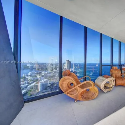Rent this 2 bed apartment on 17141 Collins Ave