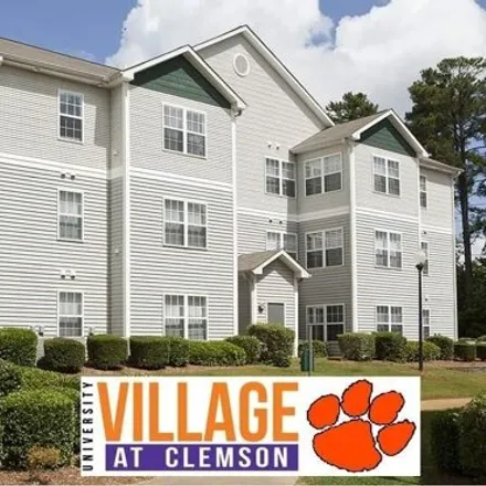 Buy this 4 bed condo on 120 University Village Drive in University Village, Central