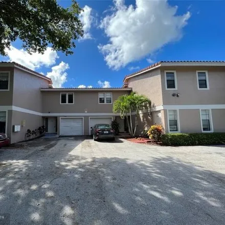 Buy this 11 bed house on 4382 Northwest 115th Avenue in Coral Springs, FL 33065