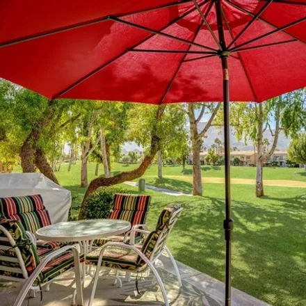 Rent this 3 bed condo on Jack Nicklaus Resort Golf Course in Cavalcade Court, La Quinta