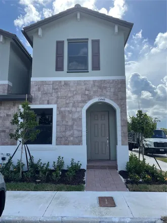 Rent this 3 bed townhouse on 3477 West 89th Terrace in Hialeah, FL 33018