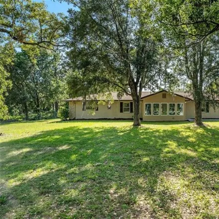 Buy this 4 bed house on 6071 Boatwrite Road in Spring Hill, FL 34609