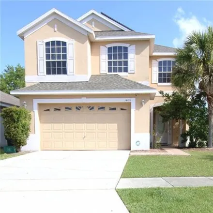 Rent this 3 bed house on 14604 Huntcliff Park Way in Meadow Woods, Orange County