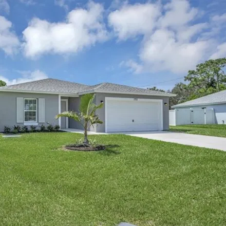 Buy this 4 bed house on 1703 Southeast Flintlock Road in Port Saint Lucie, FL 34952
