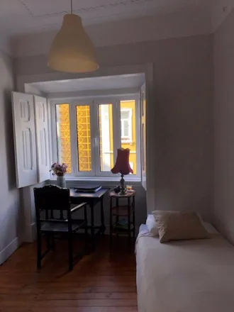 Rent this 3 bed room on Rua Damasceno Monteiro 100 in 1170-108 Lisbon, Portugal