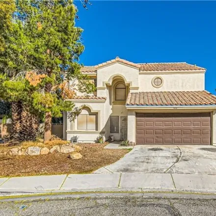 Buy this 4 bed house on Desert Rose Golf Course in 5483 Club House Drive, North Las Vegas