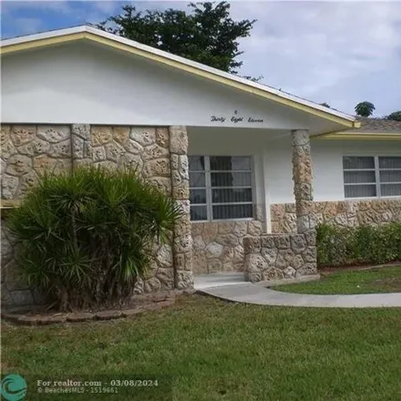 Rent this 2 bed house on 3825 Northwest 11th Street in Coconut Creek Park, Coconut Creek