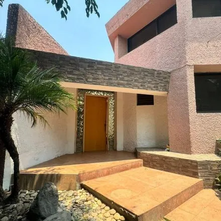 Rent this 3 bed house on Alberca in Privada Club de Golf, Club de Golf de Cuernavaca