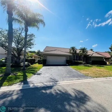 Buy this 4 bed house on 11833 Northwest 2nd Street in Coral Springs, FL 33071
