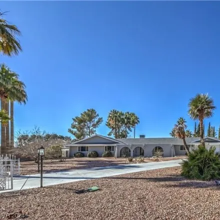 Buy this 5 bed house on 4773 North Tomsik Street in Las Vegas, NV 89129