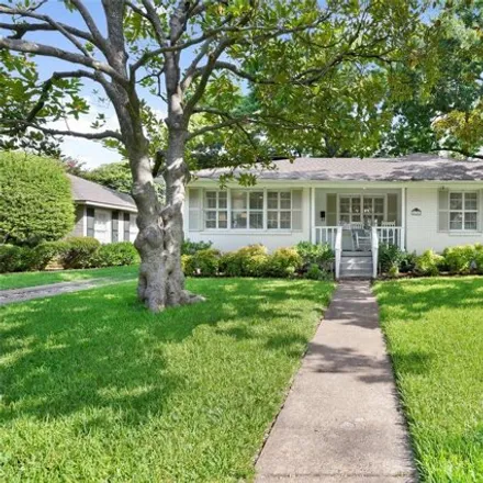 Rent this 3 bed house on 6727 Woodland Drive in Dallas, TX 75225