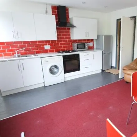 Rent this 3 bed apartment on M.G. Foods in 22-24 Woodsley Road, Leeds