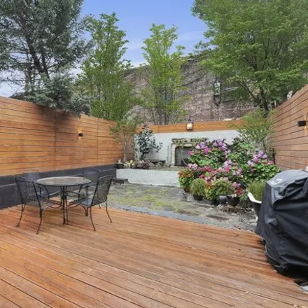 Buy this 6 bed townhouse on 168 Lefferts Place in New York, NY 11238